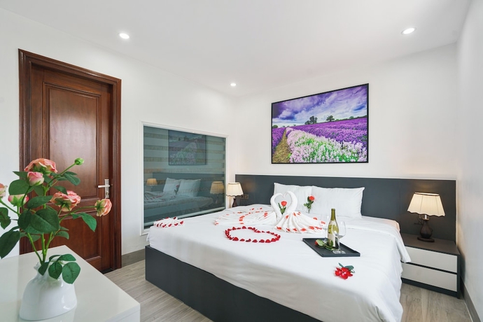 Imagen de la habitación del Hotel The Enchanted Ha Long - Bai Chay Beach. Foto 5