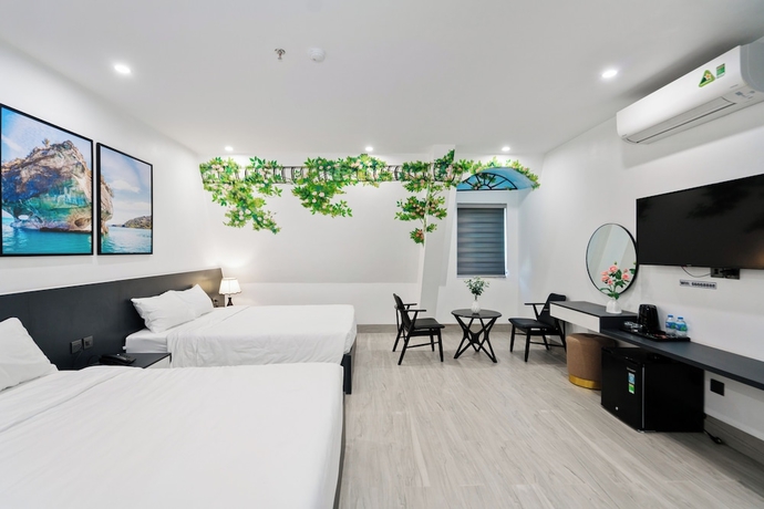 Imagen de la habitación del Hotel The Enchanted Ha Long - Bai Chay Beach. Foto 8