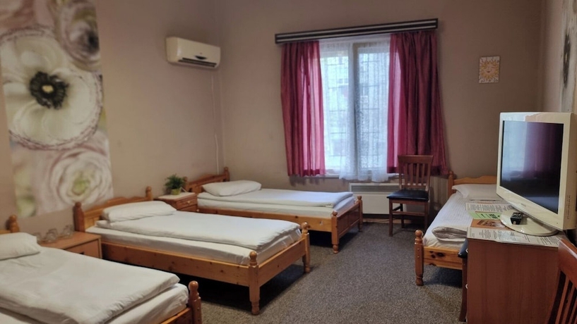 Imagen de la habitación del Hotel The English Guest House. Foto 5