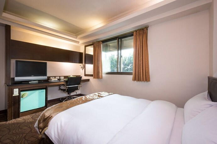 Imagen de la habitación del Hotel The Enterpriser. Foto 12
