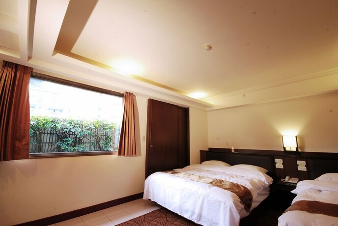 Imagen de la habitación del Hotel The Enterpriser. Foto 16