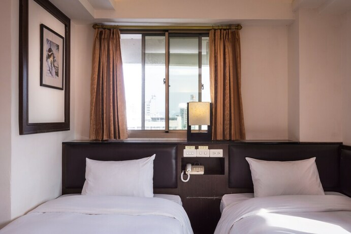 Imagen de la habitación del Hotel The Enterpriser. Foto 18