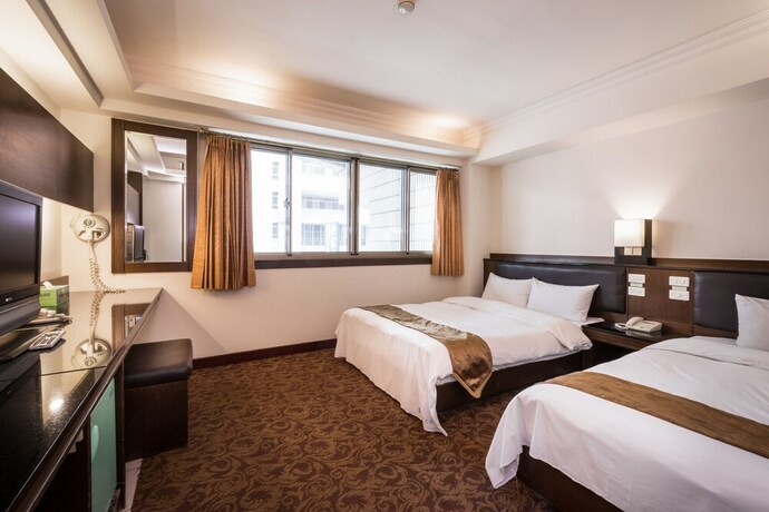 Imagen de la habitación del Hotel The Enterpriser. Foto 19