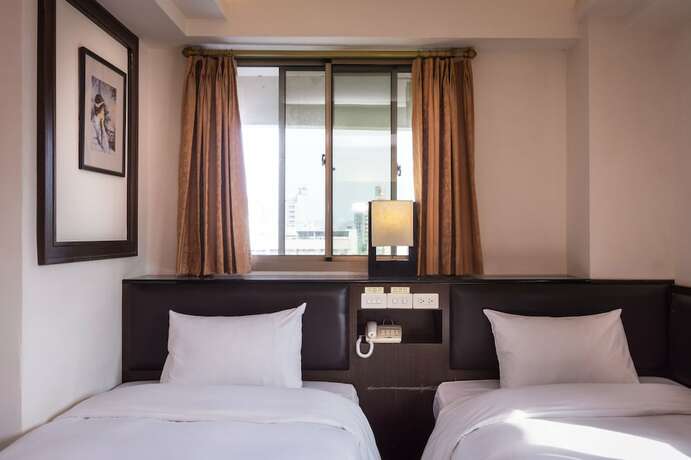 Imagen de la habitación del Hotel The Enterpriser. Foto 23