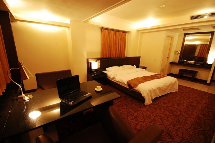 Imagen de la habitación del Hotel The Enterpriser. Foto 27