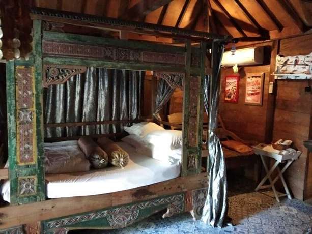 Imagen de la habitación del Hotel The Ermaja's Pavilion. Foto 13