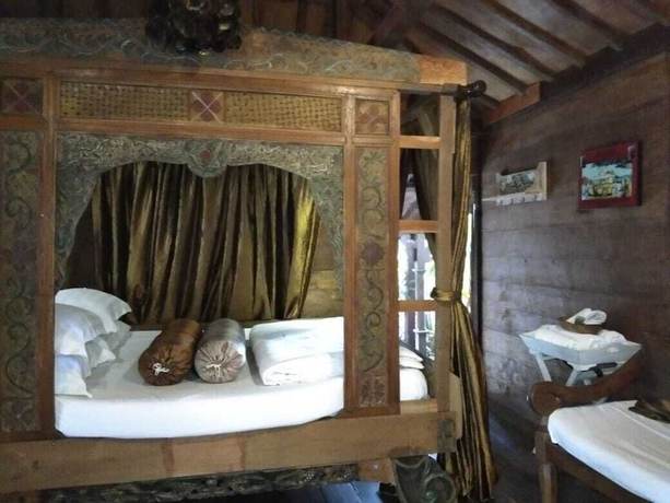 Imagen de la habitación del Hotel The Ermaja's Pavilion. Foto 17