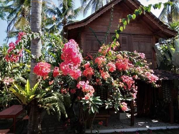 Imagen de la habitación del Hotel The Ermaja's Pavilion. Foto 19