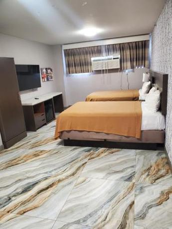 Imagen de la habitación del Hotel The Essence at JFK. Foto 8