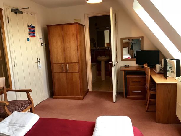 Imagen de la habitación del Hotel The Evenhill. Foto 9