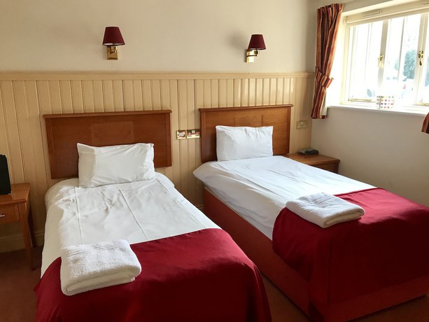 Imagen de la habitación del Hotel The Evenhill. Foto 11