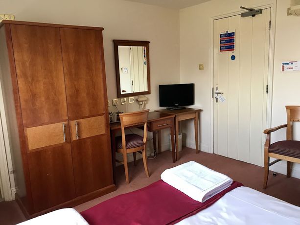 Imagen de la habitación del Hotel The Evenhill. Foto 12