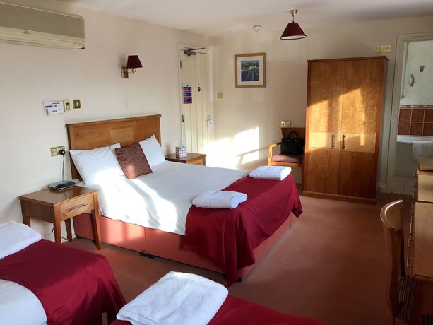 Imagen de la habitación del Hotel The Evenhill. Foto 16