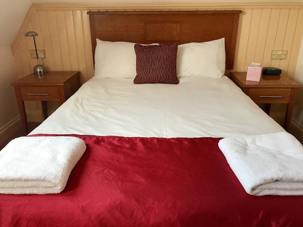 Imagen de la habitación del Hotel The Evenhill. Foto 17