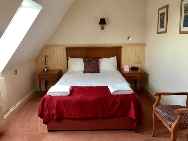 Imagen de la habitación del Hotel The Evenhill. Foto 20