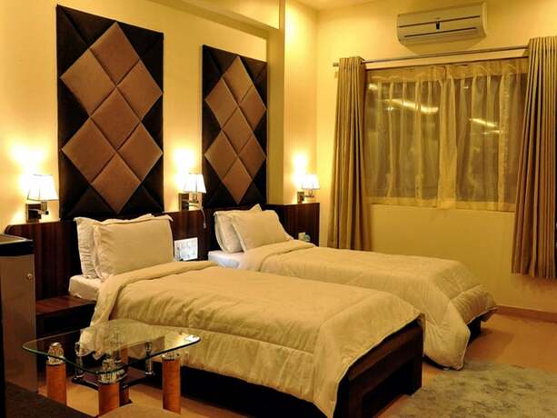 Imagen de la habitación del Hotel The Evergrand Palace. Foto 17