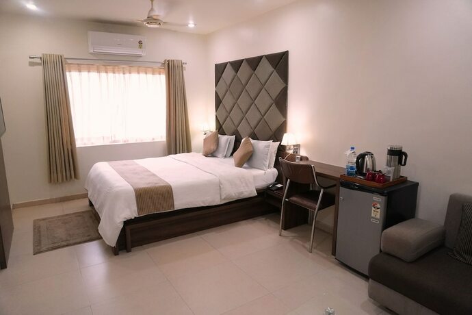 Imagen de la habitación del Hotel The Evergrand Palace. Foto 19