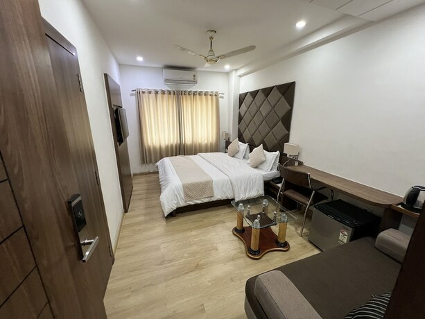Imagen de la habitación del Hotel The Evergrand Palace. Foto 22
