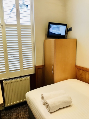 Imagen de la habitación del Hotel The Excelsior, Kings Cross. Foto 4