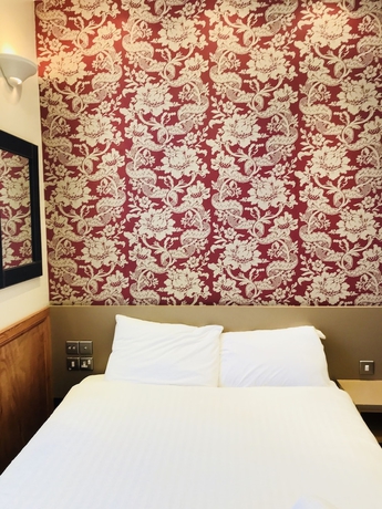 Imagen de la habitación del Hotel The Excelsior, Kings Cross. Foto 10