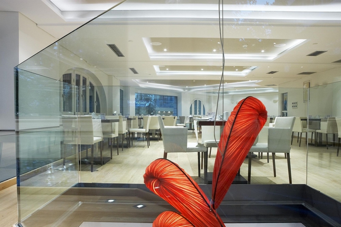 Imagen del bar/restaurante del Hotel The Excelsior Small Luxury Hotels Of The World. Foto 6