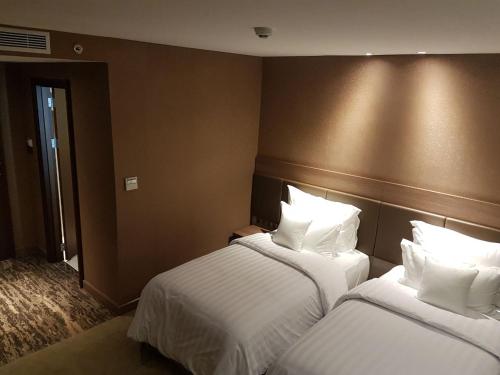 Imagen de la habitación del Hotel The Excelton Hotel. Foto 6