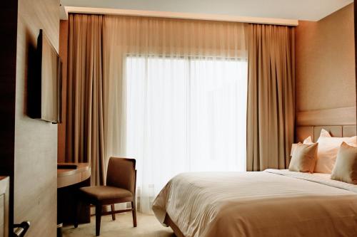 Imagen general del Hotel The Excelton Hotel. Foto 2