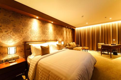 Imagen de la habitación del Hotel The Excelton Hotel. Foto 10