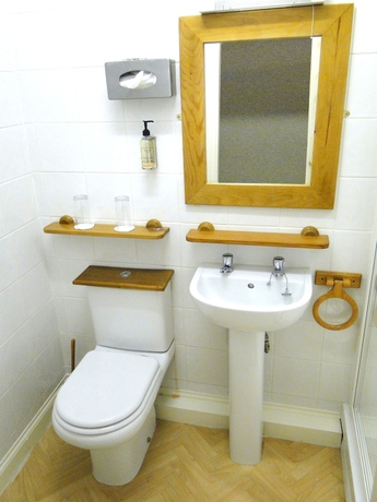 Imagen de la habitación del Hotel The Exchange Coach House Inn. Foto 17