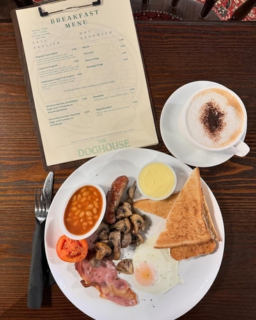 Imagen del bar/restaurante del Hotel The Exchange Coach House Inn. Foto 2