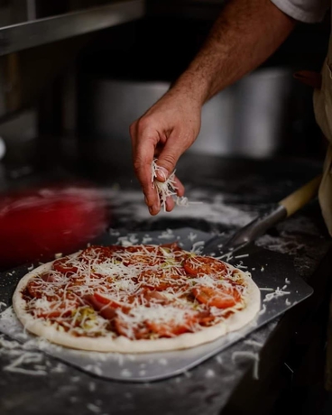 Imagen del bar/restaurante del Hotel The Exchange Coach House Inn. Foto 6