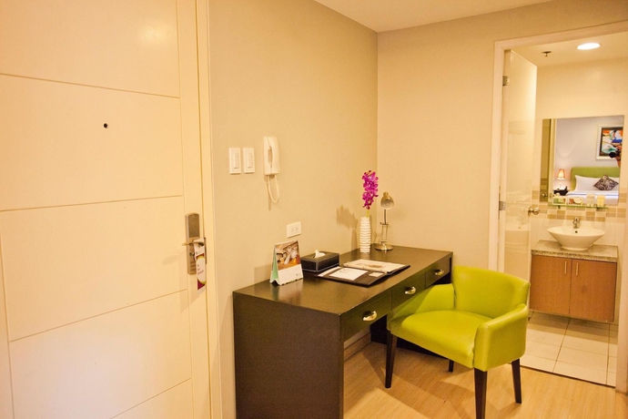 Imagen de la habitación del Hotel The Exchange Regency Residence. Foto 4