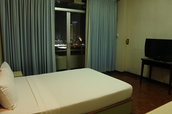 Imagen de la habitación del Hotel The Executive House. Foto 6