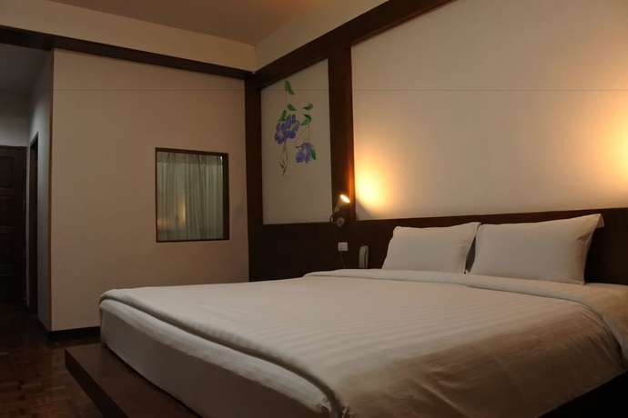 Imagen de la habitación del Hotel The Executive House. Foto 9
