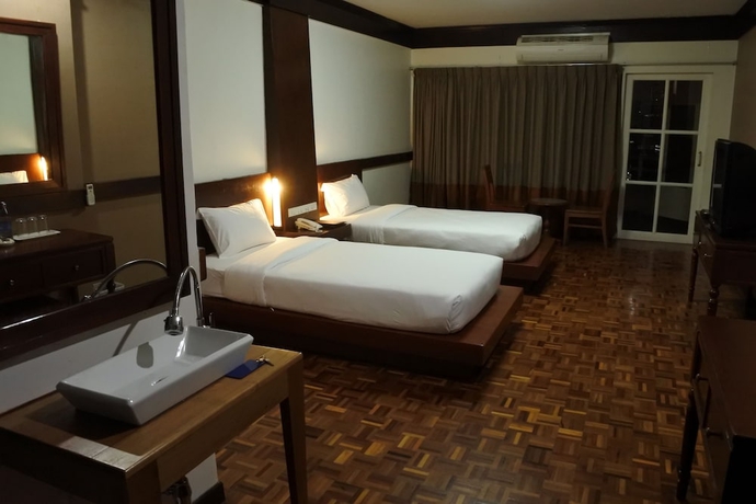 Imagen de la habitación del Hotel The Executive House. Foto 11
