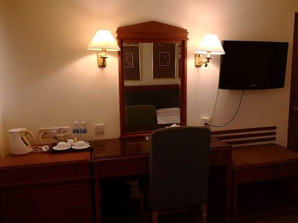 Imagen de la habitación del Hotel The Executive Lahad Datu. Foto 4