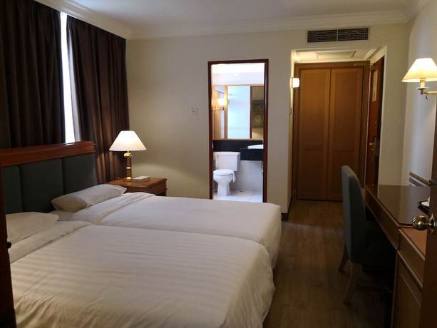 Imagen de la habitación del Hotel The Executive Lahad Datu. Foto 5