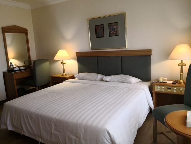 Imagen de la habitación del Hotel The Executive Lahad Datu. Foto 14