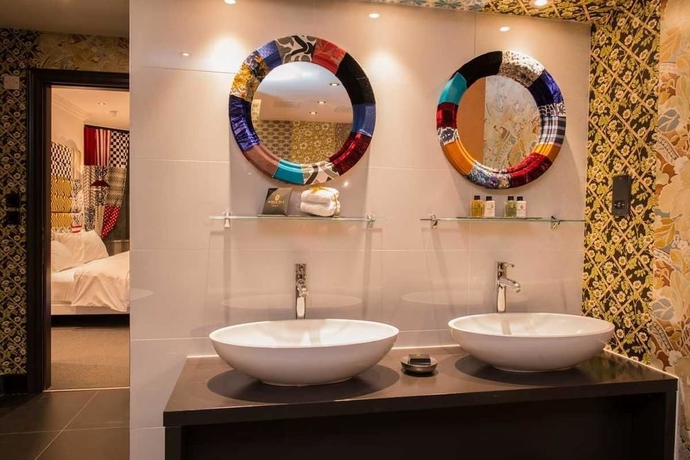 Imagen de la habitación del Hotel The Exhibitionist. Foto 9