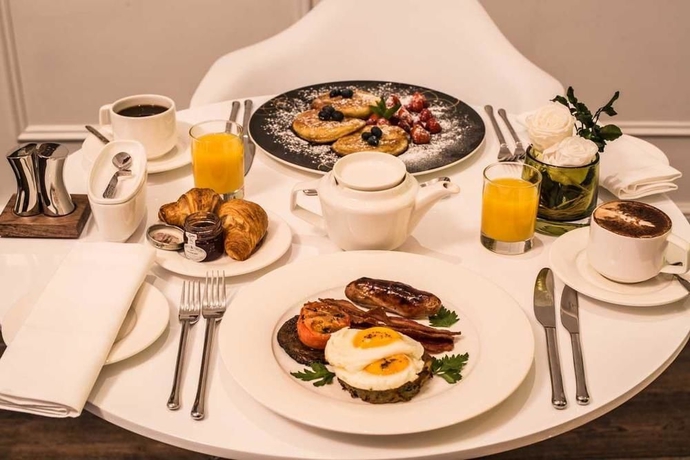 Imagen del bar/restaurante del Hotel The Exhibitionist. Foto 7