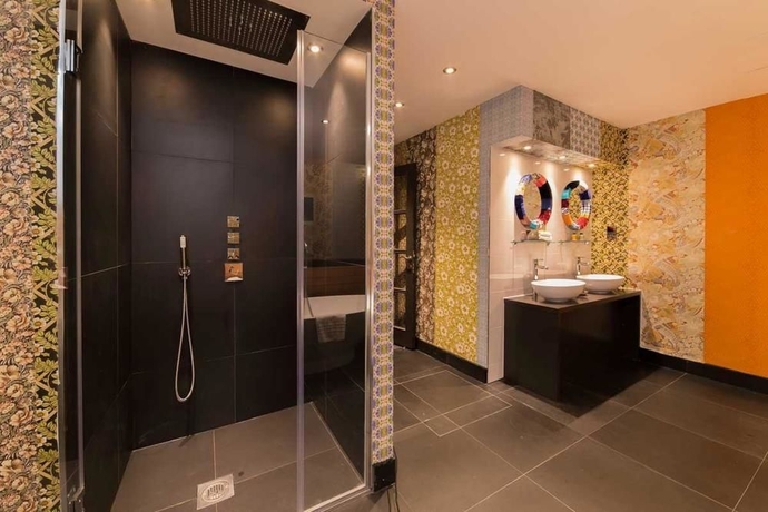 Imagen de la habitación del Hotel The Exhibitionist. Foto 13