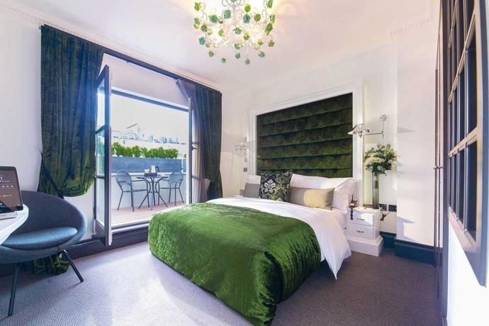 Imagen de la habitación del Hotel The Exhibitionist. Foto 15