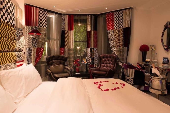 Imagen de la habitación del Hotel The Exhibitionist. Foto 16