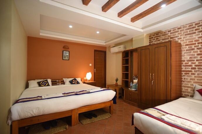 Imagen de la habitación del Hotel The Exotic House. Foto 18