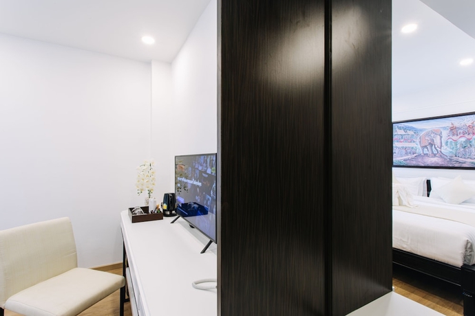 Imagen de la habitación del Hotel The Experience Walking Street Chiang Mai. Foto 17