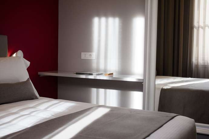 Imagen de la habitación del Hotel The FRAME. Foto 15