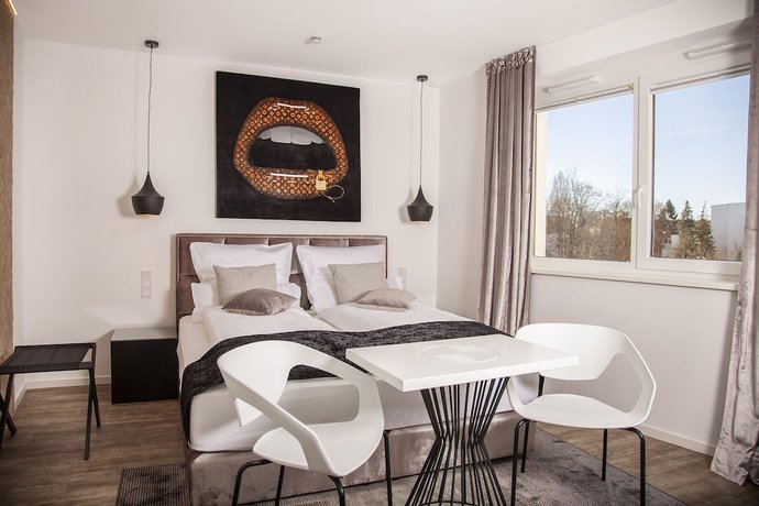 Imagen de la habitación del Hotel The Faces Berlin. Foto 16