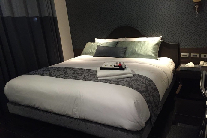 Imagen de la habitación del Hotel The Fah Silom. Foto 13