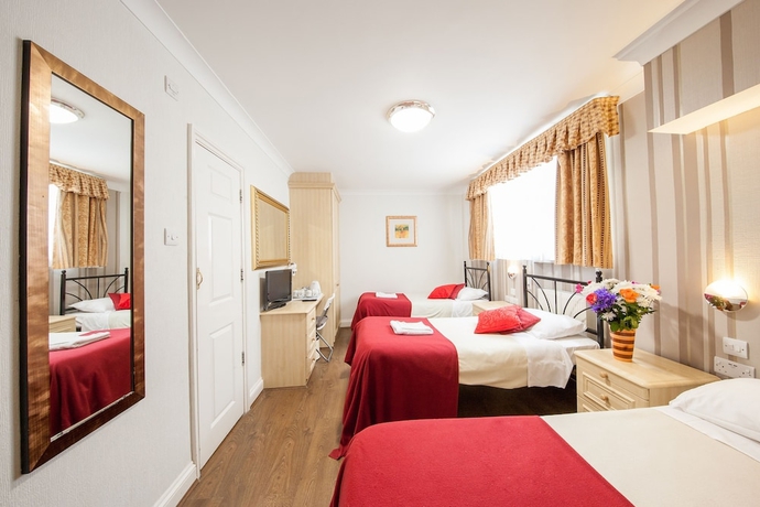 Imagen de la habitación del Hotel The Fairway. Foto 2