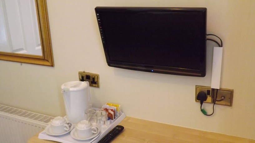 Imagen de la habitación del Hotel The Fairway. Foto 5